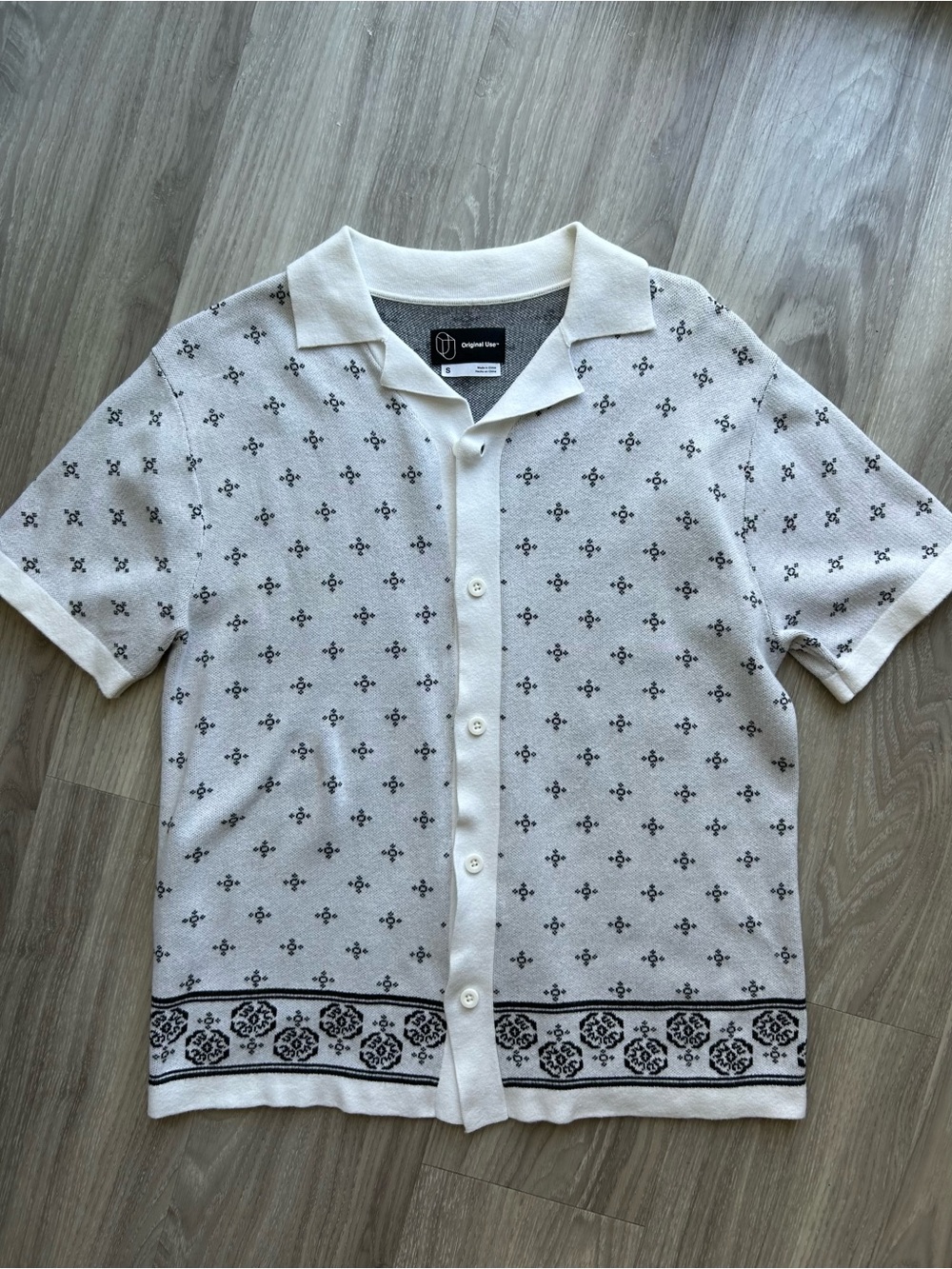 Original Use Cream Short-Sleeve Knit Polo with Black Motif